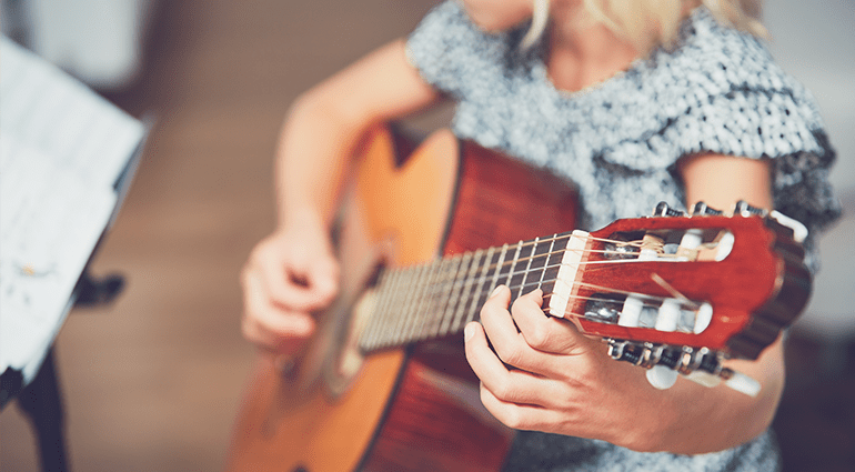 He plays the guitar. He plays guitar. Which is correct?